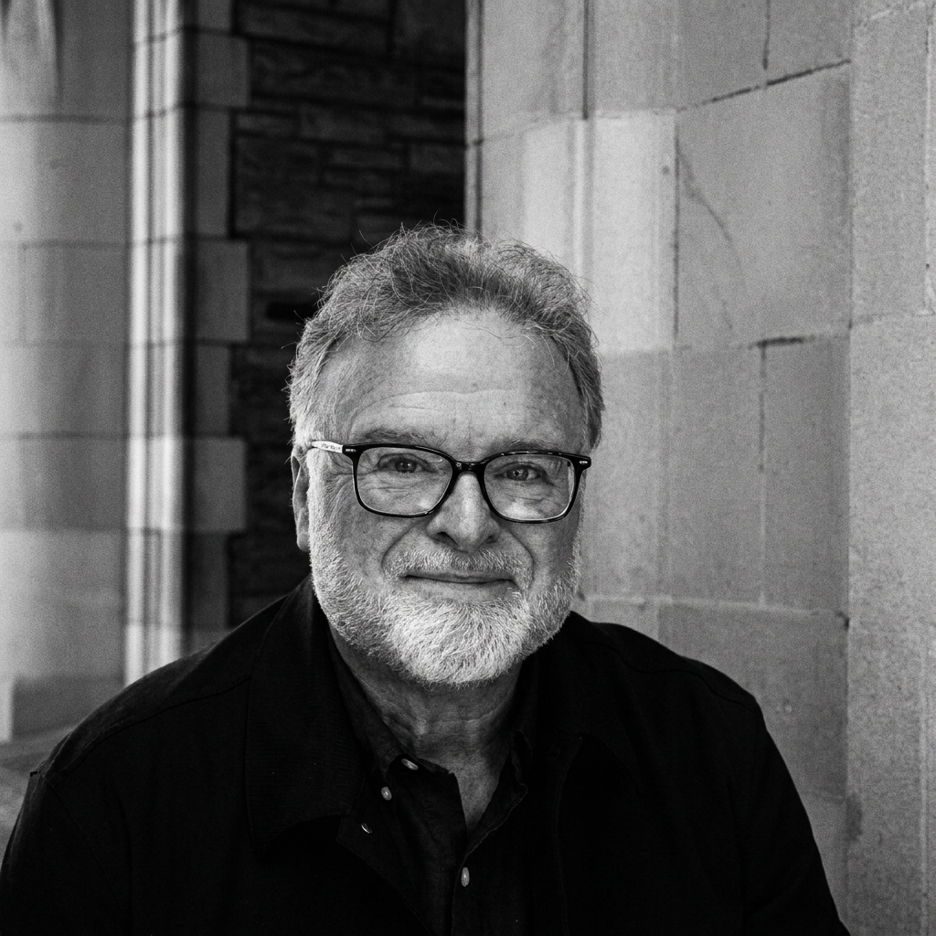 Andrew Meldrum outside a stone building