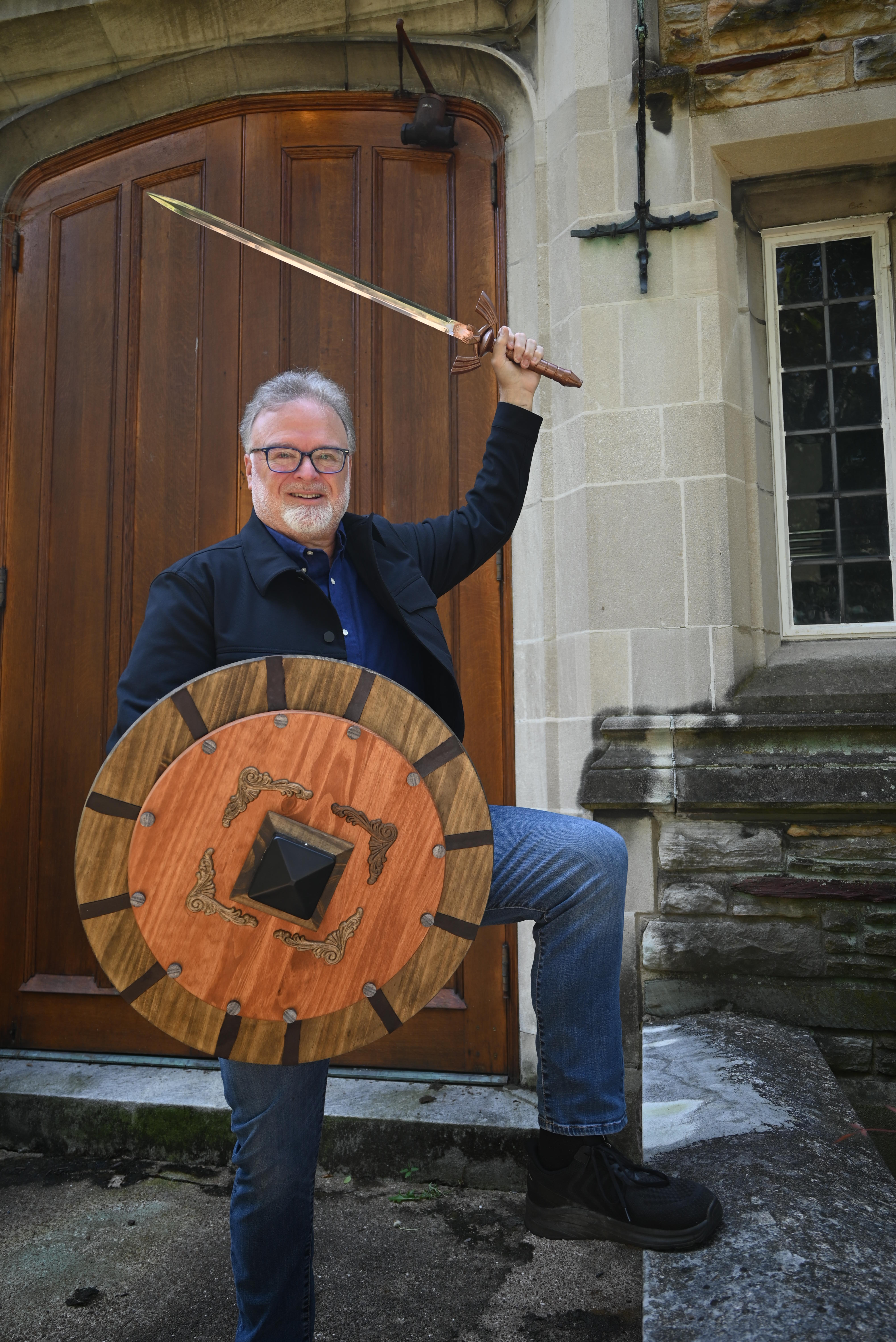 Andrew with raised sword and shield